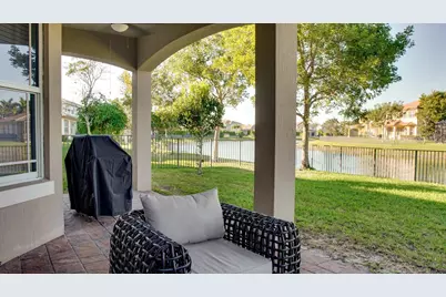 9911 S Miralago Way, Parkland, FL 33076 - Photo 13