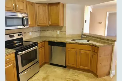 8721 Wiles Road #104, Coral Springs, FL 33067 - Photo 3