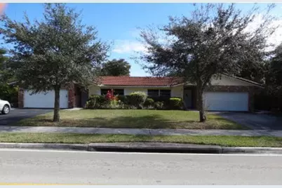 3991 Woodside Drive, Coral Springs, FL 33065 - Photo 1