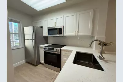 2106 S Cypress Bend Drive #210, Pompano Beach, FL 33069 - Photo 1