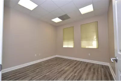 7551 Wiles Road #101, Coral Springs, FL 33067 - Photo 13