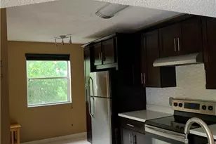 8891 Wiles Rd, Pompano Beach, FL 33067 - Photo 1