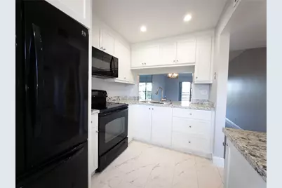 10332 Sunrise Lakes Boulevard #310, Sunrise, FL 33322 - Photo 7