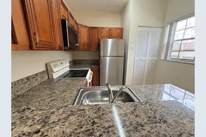 671 Cypress Lake Boulevard #D, Pompano Beach, FL 33064 - Photo 1