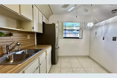 6090 N Sabal Palm Boulevard #108, Tamarac, FL 33319 - Photo 3