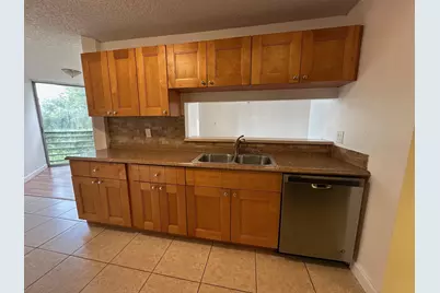 3100 N Pine Island Road #404, Sunrise, FL 33351 - Photo 1