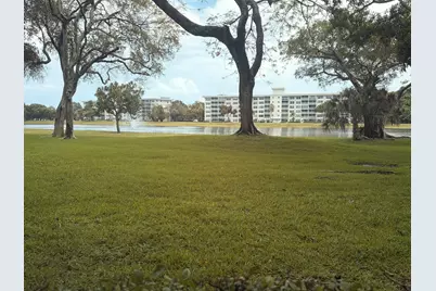 2940 N Course Drive #104, Pompano Beach, FL 33069 - Photo 1