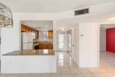 8081 N Sunrise Lakes Drive #203, Sunrise, FL 33322 - Photo 1