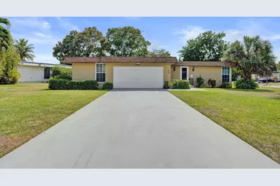 7018 NW 64th Street, Tamarac, FL 33321 - Photo 1