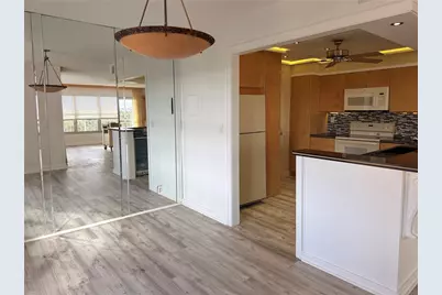 10777 W Sample Road #706, Coral Springs, FL 33065 - Photo 9