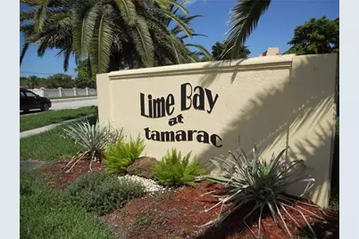 9091 Lime Bay Boulevard #304, Tamarac, FL 33321 - Photo 1