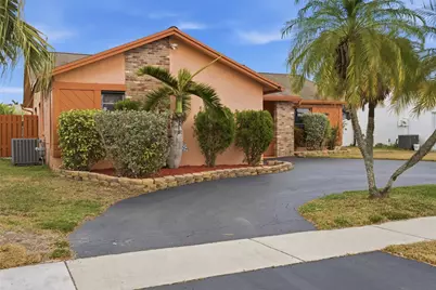 11841 NW 39th Place, Sunrise, FL 33323 - Photo 1