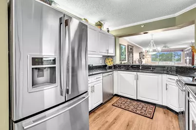 9587 Weldon Circle #B311, Tamarac, FL 33321 - Photo 7