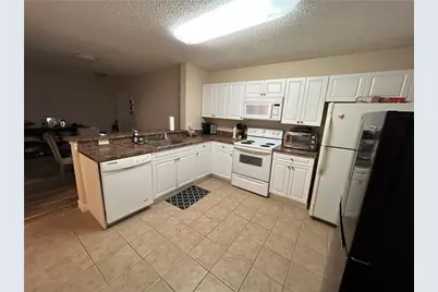 5861 Riverside Drive #103, Coral Springs, FL 33067 - Photo 7