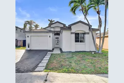 1451 NW 47th Avenue, Coconut Creek, FL 33063 - Photo 1