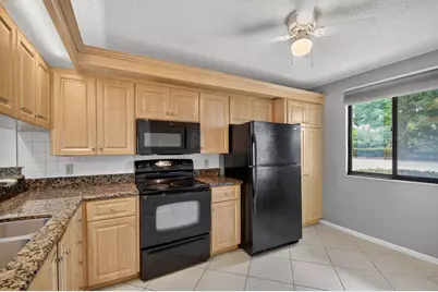 2461 Village Boulevard #101, West Palm Beach, FL 33409 - Photo 1
