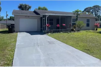 1719 SW Import Drive, Port Saint Lucie, FL 34953 - Photo 1