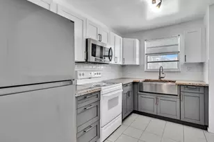 137 Golden Isles Dr, Hallandale Beach, FL 33009 - Photo 1