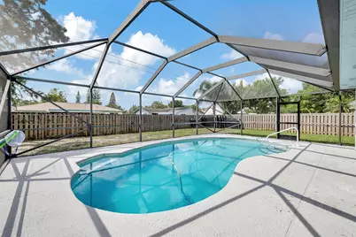 1124 SE Ladner Street, Port Saint Lucie, FL 34983 - Photo 1