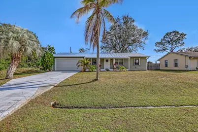 1925 SW Idaho Lane, Port Saint Lucie, FL 34984 - Photo 1