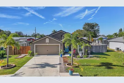 452 SE Asbury Lane, Port Saint Lucie, FL 34983 - Photo 1