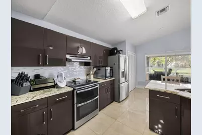 126 Hammocks Court, Greenacres, FL 33413 - Photo 9