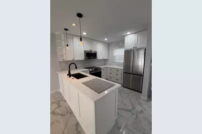 12007 Poinciana Boulevard #108, Royal Palm Beach, FL 33411 - Photo 1