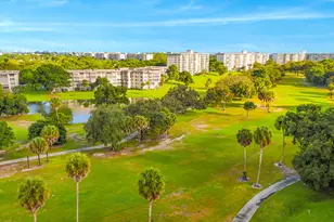 3900 Oaks Clubhouse Dr, Pompano Beach, FL 33069 - Photo 1