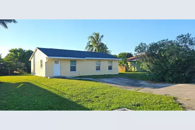323 Seminole Court, Pahokee, FL 33476 - Photo 1