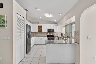 320 NE Surfside Avenue, Port Saint Lucie, FL 34983 - Photo 11