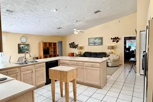 2884 SE Ranch Acres Cir, Jupiter, FL 33478 - Photo 11