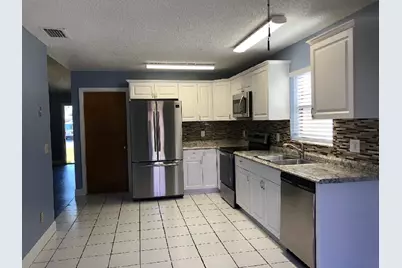 5890 SE Wilsie Drive SE, Stuart, FL 34997 - Photo 1