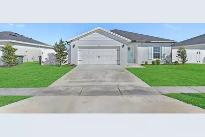 113 Dabou Loop, Belle Glade, FL 33430 - Photo 1