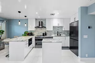 100 Bravado Ln, Palm Beach Shores, FL 33404 - Photo 1