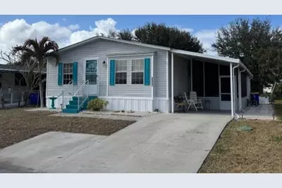 6927 SE Delegate Street, Hobe Sound, FL 33455 - Photo 1