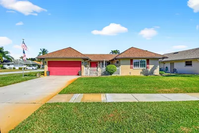 10260 Greentrail Drive N, Boynton Beach, FL 33436 - Photo 1
