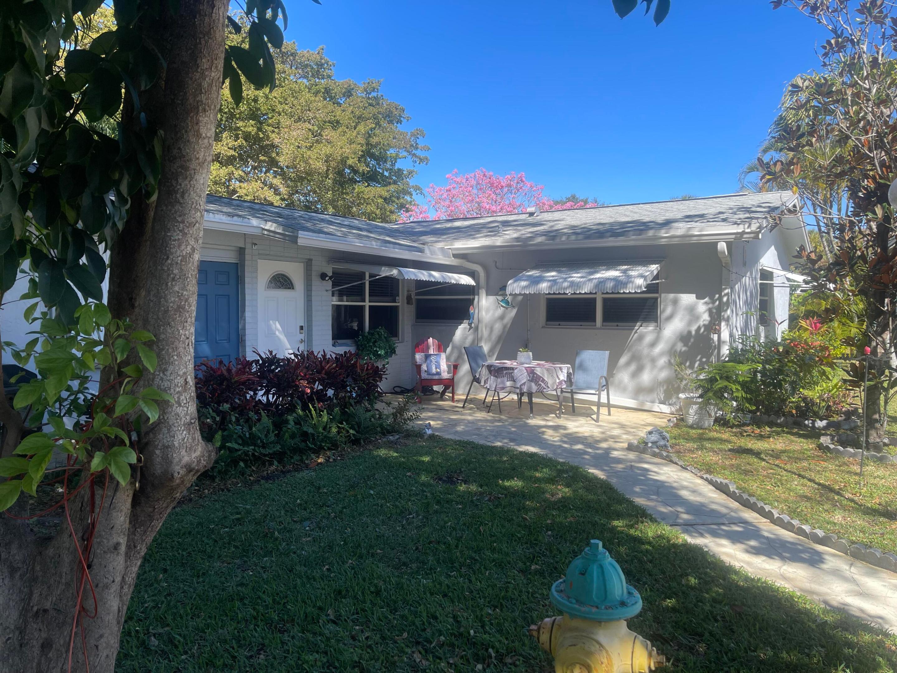 3123 SW Natura Ave main architectural view