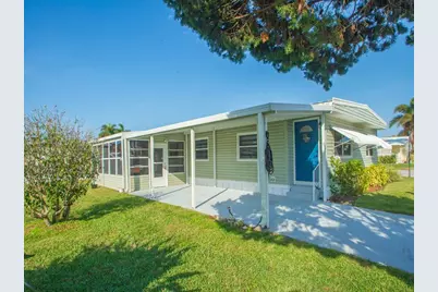 309 NE Pinelake Village Boulevard, Jensen Beach, FL 34957 - Photo 1