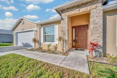 1037 SW Payne Avenue, Port Saint Lucie, FL 34953 - Photo 1