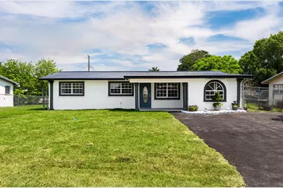 933 SE 2nd Street, Belle Glade, FL 33430 - Photo 1