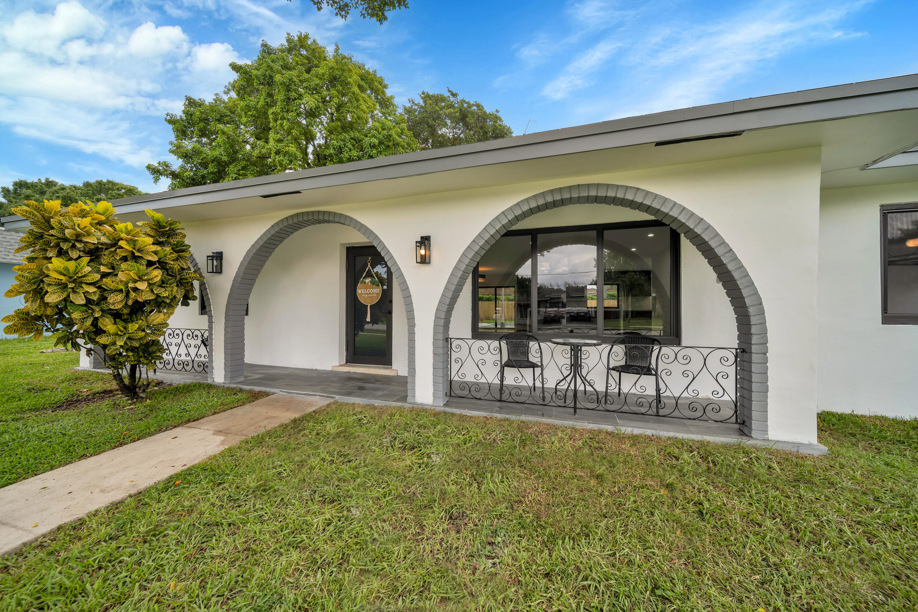 7301 NW 13th Ct main architectural view