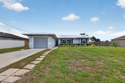 1031 SW Idol Avenue, Port Saint Lucie, FL 34953 - Photo 1