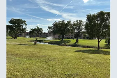 9481 Sunrise Lakes Boulevard #102, Sunrise, FL 33322 - Photo 1