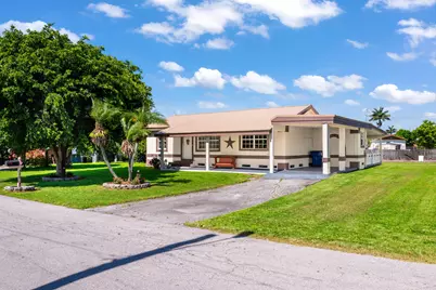 410 SE 4th Avenue, South Bay, FL 33493 - Photo 1