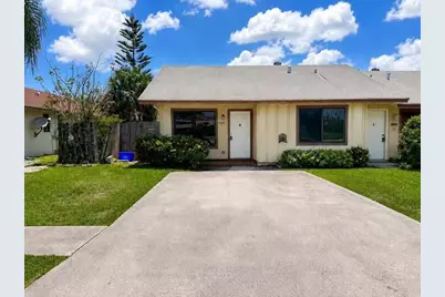 9202 E Highland Pines Boulevard, Palm Beach Gardens, FL 33418 - Photo 1