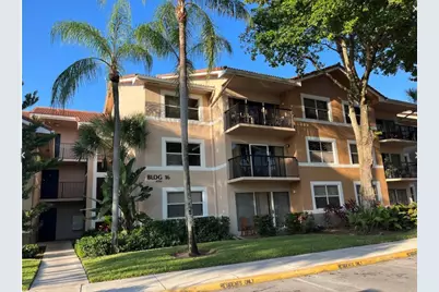 9055 Wiles Road #307, Coral Springs, FL 33067 - Photo 1