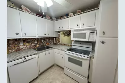 3180 Holiday Springs Boulevard #107, Pompano Beach, FL 33063 - Photo 1