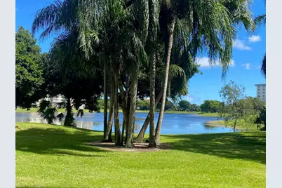 3051 N Course Drive #104, Pompano Beach, FL 33069 - Photo 1