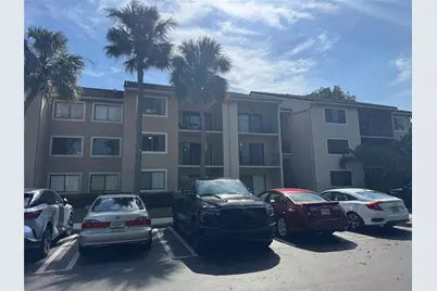 9001 Wiles Road #305, Coral Springs, FL 33067 - Photo 1