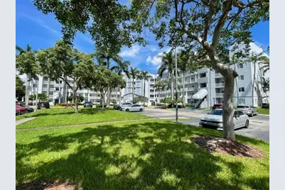 10700 NW 66 Street #302, Doral, FL 33178 - Photo 1